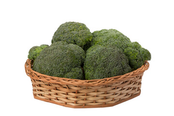 broccoli in wicker basket on isolated white background