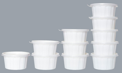 Lined plastic containers up on grey background.(clipping mask included)
