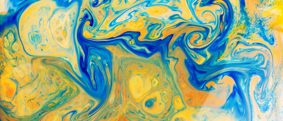 Fluid Art. Abstract blurred colorful background. Swirl liquid pattern. Marble effect of blue yellow color. Trendy colorful backdrop. Mixing paints