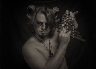 Faun with panflute