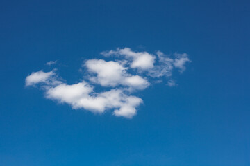 Cumulus white cloud on a blue sky