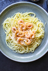 pasta shrimp
spaghetti creamy seafood sauce main dish
food background top view copy space for text
organic healthy eating