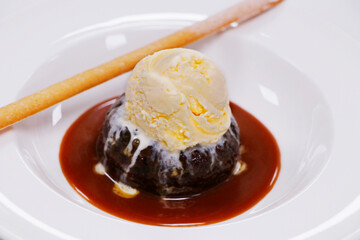 sticky toffee pudding with vanilla ice cream and caramel sauce.
