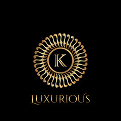 Circle luxury logo with letter K and symmetric swirl shape vector design logo