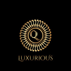 Circle luxury logo with letter Q and symmetric swirl shape vector design logo
