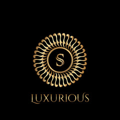 Circle luxury logo with letter S and symmetric swirl shape vector design logo