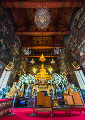 Golden Buddha Statue in the Temple of Dawn (Wat Arun) Interior, in Bangkok, Thailand