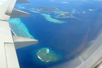 Fototapeta na wymiar Fiji island, porthole and wing plane