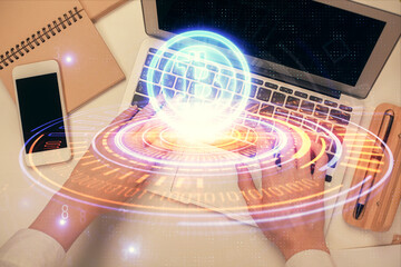 Double exposure of woman hands working on computer and blockchain theme hologram drawing. Top View. bitcoin cryptocurrency concept.