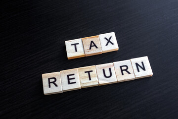 Tax return word wooden blocks