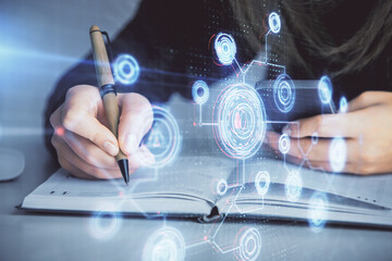 Multi exposure of woman hands working on computer and data theme hologram drawing. Tech concept.