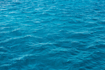 Fototapeta na wymiar sea waves pattern. blue waves background. Blue waves of Red sea. 