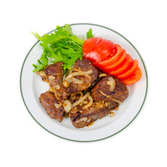 Pieces of fried liver with onions, fresh leaves of salads