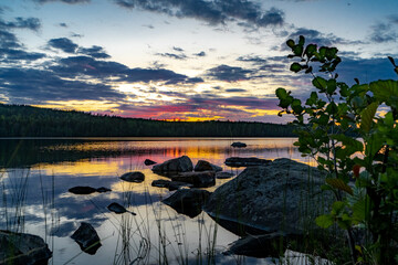 Colorful sunset over lake Ljugaren in Sweden