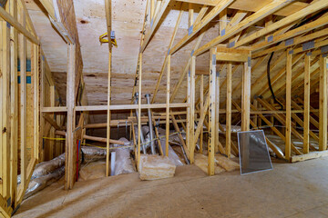 Framing beam of house attic under construction interior a walls ceiling material in wooden frame