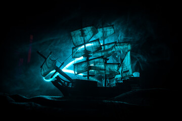 Black silhouette of the pirate ship in night