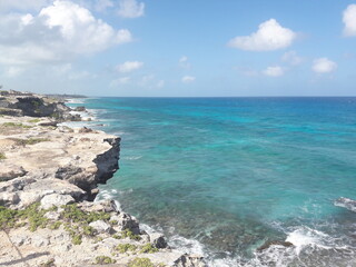 Isla Mujeres South Point Cancun Mexico rocky shore blue water and crashing waves 2020
