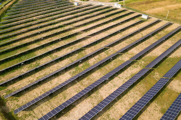 Aerial view of solar power plant. Electric panels for producing clean ecologic energy.