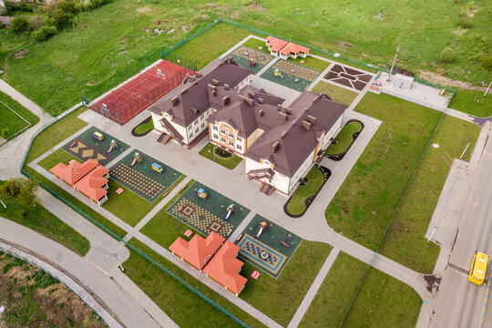 Aerial view of new prescool building in residential rural area.