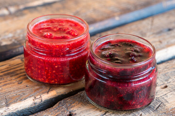 raspberry and currant jam in small jars