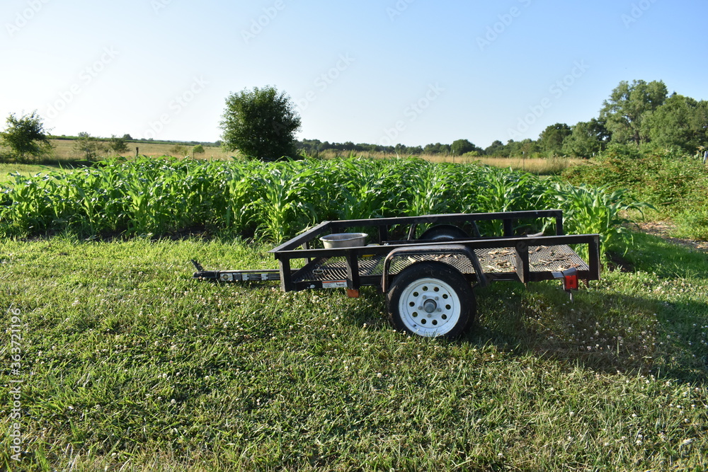 Sticker trailer by a garden