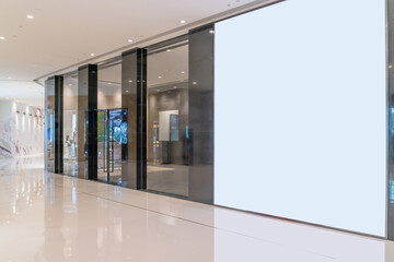 Empty billboard for mock up in modern shopping mall.
