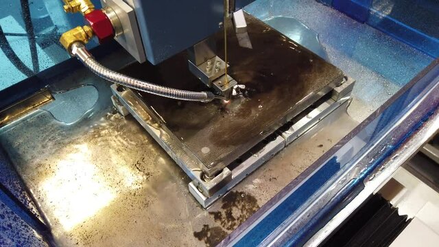 Electroerosive CNC EDM machine in the process.