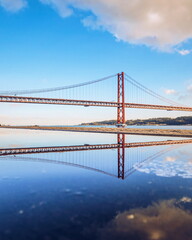 The 24 de Abril Bridge water reflection, Lisbon, Portugal