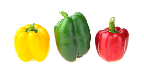 Obraz na płótnie Canvas three red, yellow and green bell peppers isolated on white background. Studio macro shot composition.