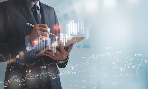Finance analyst businessman analyzing stock market trend with forex graph on virtual screen