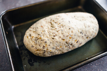 simple food ingredients, homemade sourdouhg bread on kitchen counter