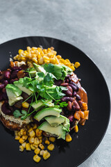 plant-based food, vegan mexican-inspired beans corn and avocado toast