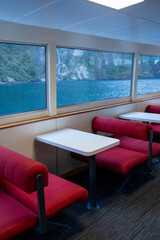 Interior of cruise with beautiful scenic of milford sound in fiordland national park new zealand.