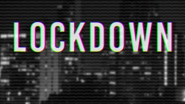 Lockdown text against cityscape in background