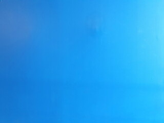 Beautiful abstract decoration dark blue grunge cement wall plastering wall with light shining to the right Space is blank for filling text
