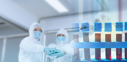 Fototapeta premium Chemists join hands in the hope that Successfully developed blood diagnosis Internal laboratory examination Modern medical biotechnology