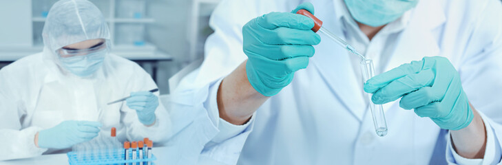 Fototapeta premium chemists test and develop blood compatibility in humans medical laboratories. Modern medical biotechnology.double exposure.