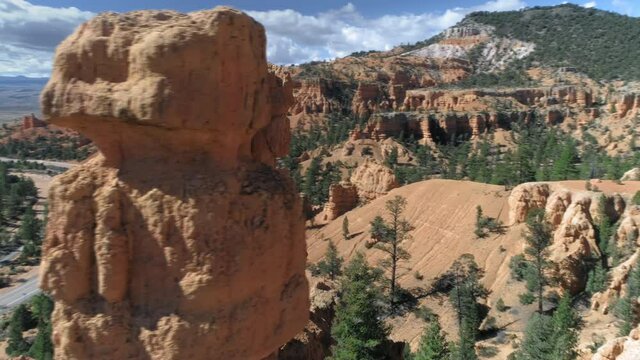 4K circular drone flight around marvelous red spire-shaped rock hoodoo formations at Bryce canyon, Utah. Scenic aerial view on the nature amphitheater in beautiful landscapes. Travel USA stock footage