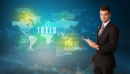 Businessman in front of a decision with TAXES inscription, business concept