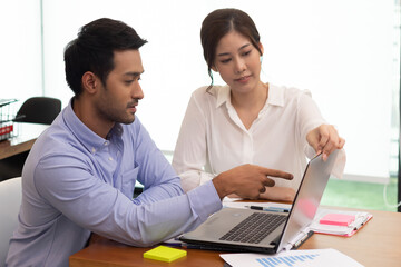 Obraz premium Asian business man and women meeting and talk about job in office.