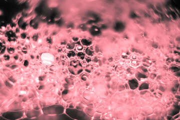 bubbles soap on water surface, shine with a bright, shimmering reflected light.
