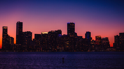 Naklejka premium miami city skyline at sunset night florida buildings panorama downtown colors 