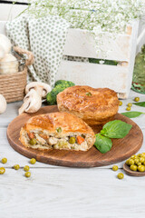 Baked pie with meat and green peas