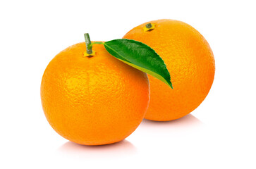 Closeup two fresh organic orange fruit with green leaf isolated on white background. Full depth of field.