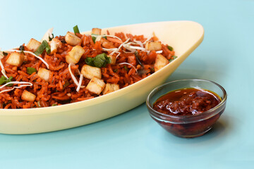 Schezwan paneer fried rice with schezwan sauce,Chinese fried rice with paneer,indo-chinese cuisine dishes. selective focus