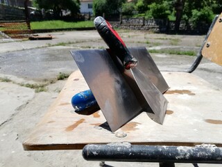 Craftsman plaster tools. Polished trowel,  putty scraper and trowel