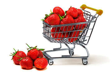 Strawberry. Sweet organic fragrant strawberries in a mini-cart for shopping isolated on a white...