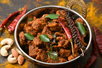 Beef fry curry roast mutton curry meat dish Kerala, India. Hot and spicy homemade side dish of Kappa biryani , Appam, Parotta, Puttu. South Indian non veg food
