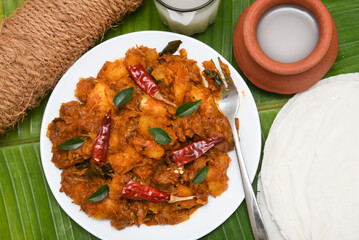 Popular traditional South Indian food  Kappa or tapioca biryani hot and spicy dish made with cooked...