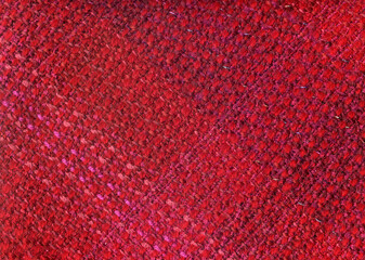 Fototapeta premium Handwoven fabric in red tones